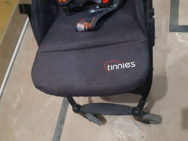 Tinnis slightly used branded Pram 5