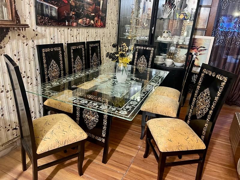 Slightly used 8,chairs designer dining set 1