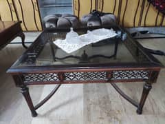 Centre table with glass top