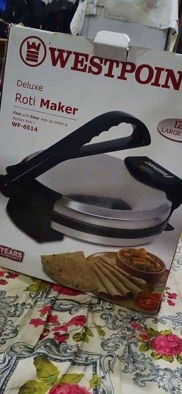 DELUXE ROTI MAKER for sale see descripton 0