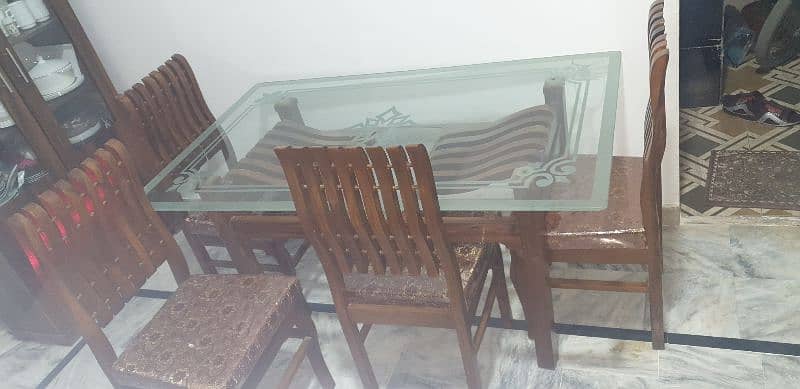 6 wooden chairs and glass table 4