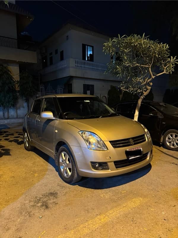 Suzuki Swift 2014 beige color in mint condition 1