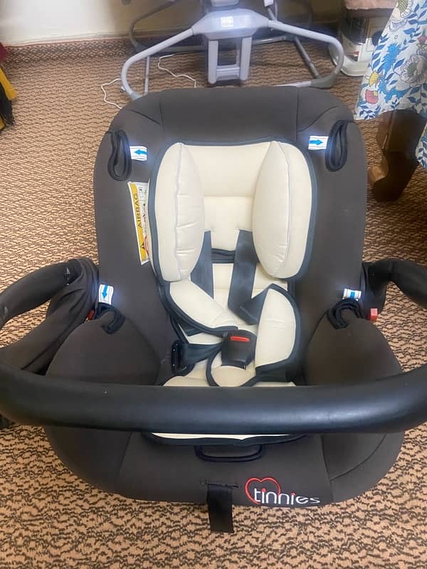 carry cot plus car seat branded 2