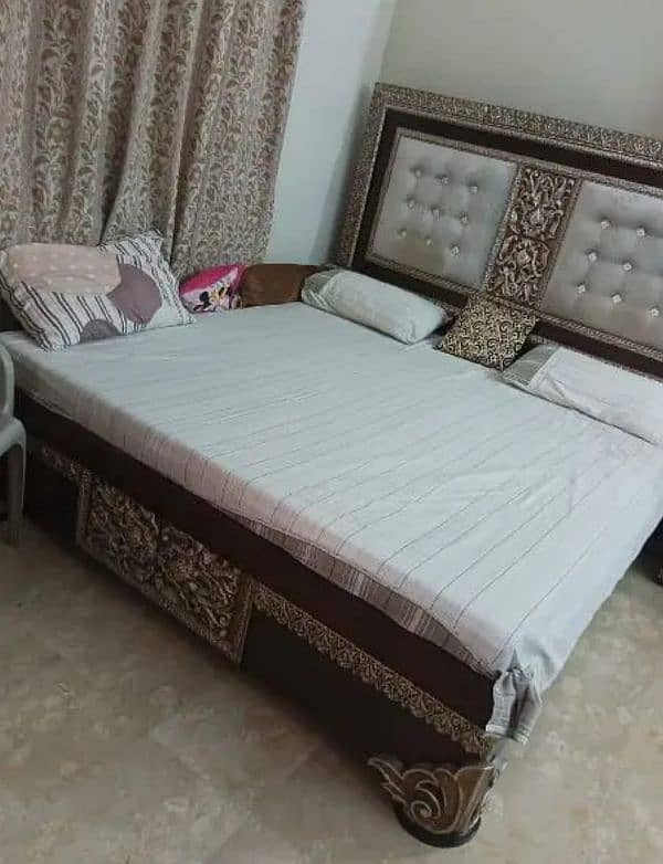 wooden bed with side tables 0