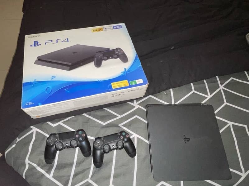 ps4 slim with box  + 2 original controllers 0