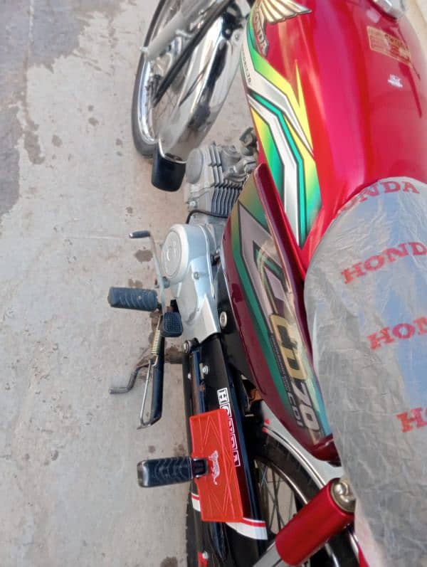 Honda CD70 model 2023 New Condition All Punjab number. . . . . Urgent Sale 2