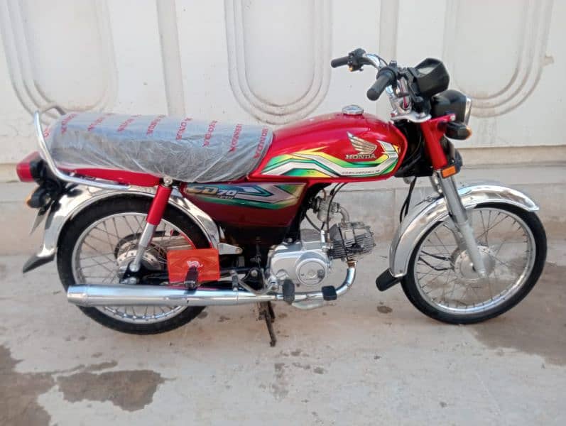 Honda CD70 model 2023 New Condition All Punjab number. . . . . Urgent Sale 9