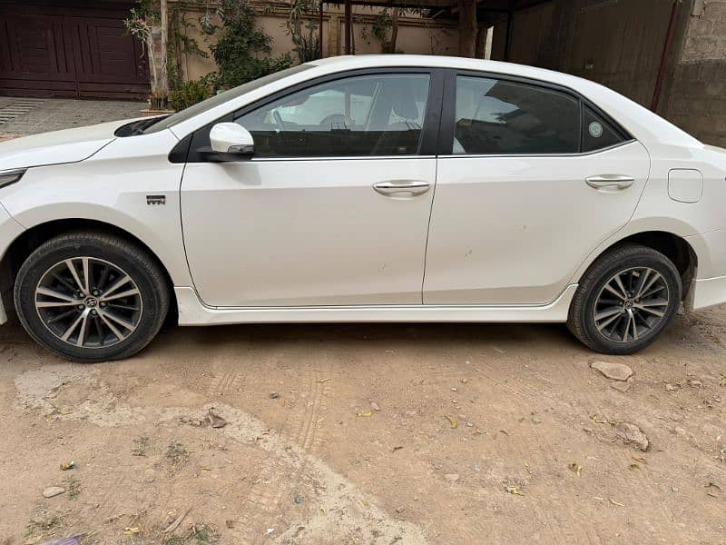 Toyota Altis Grande 2022 black interior super white 1