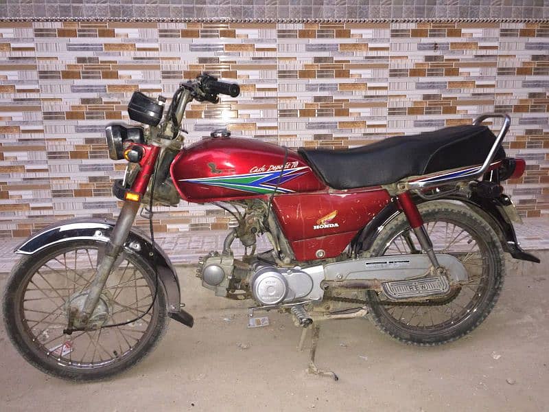 I am selling my genuine Honda CD 70 0