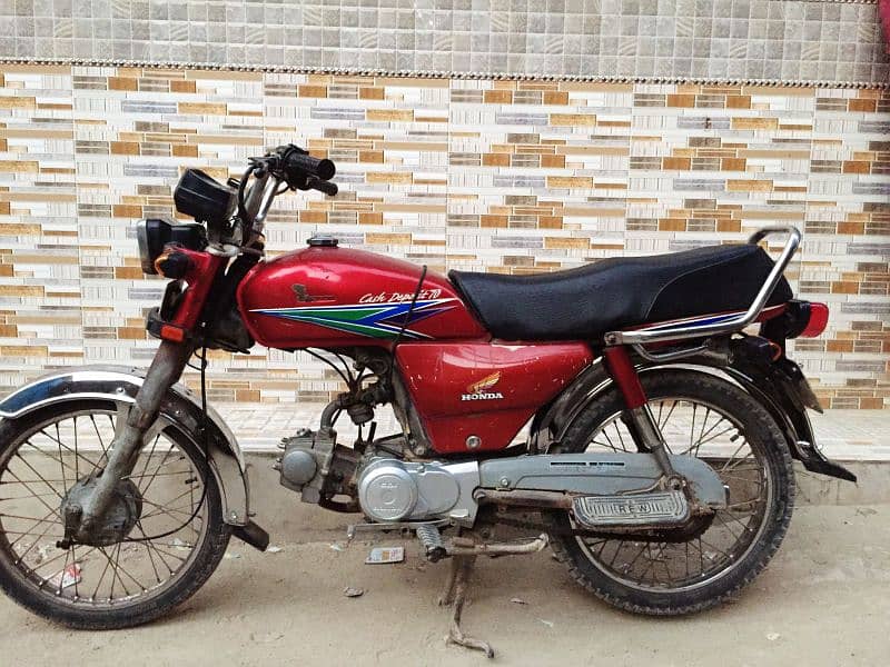 I am selling my genuine Honda CD 70 5