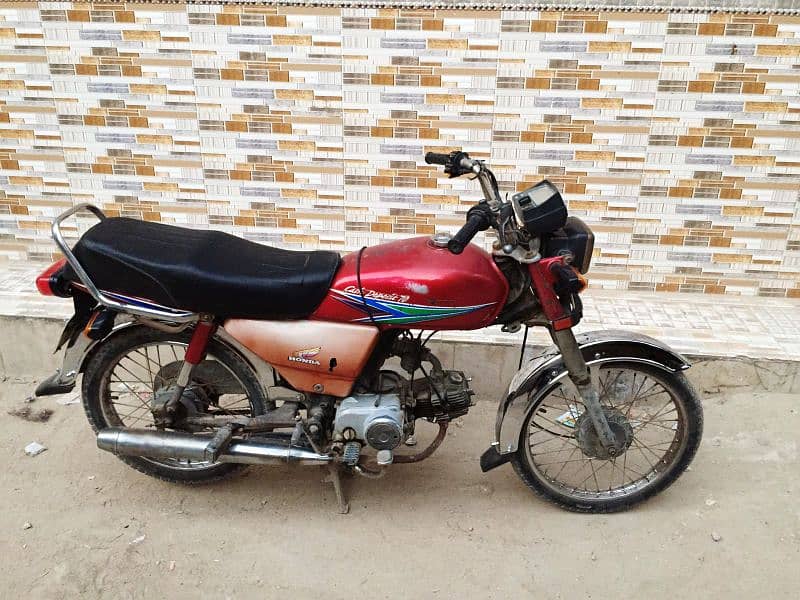 I am selling my genuine Honda CD 70 7