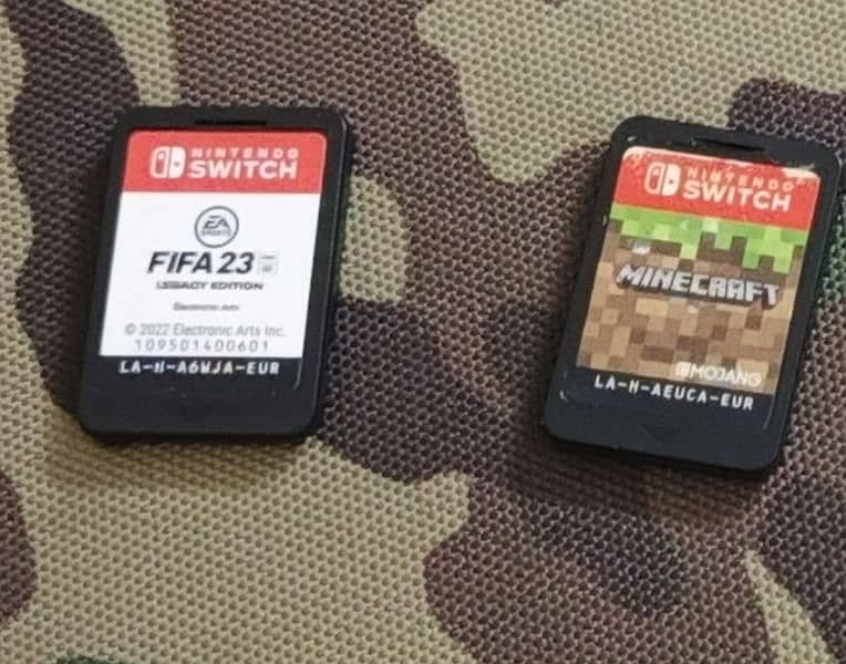 Nintendo Switch FIFA 23 + Mine craft 0