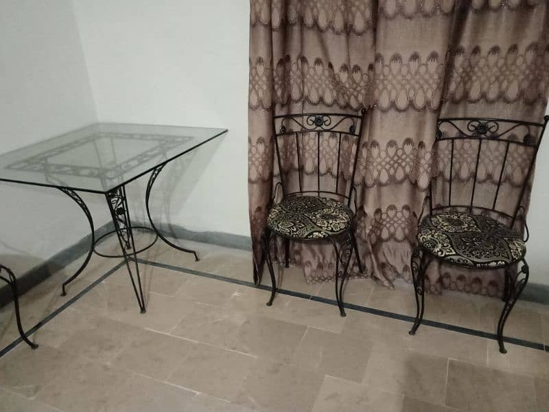 IRON GLASS DINING TABLE ( 12 MM GLASS)DINING TABLE GOOD CONDITION 1