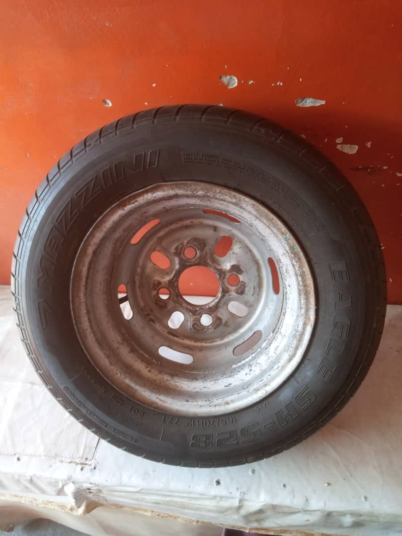 tyre with rim 80%. carry bolan junine steeriing 2