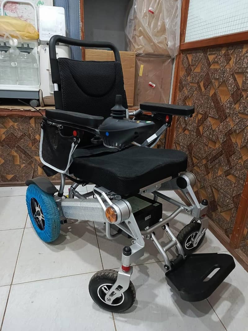 Electric wheel chair/ moterized wheel chair /patient wheel chair 9