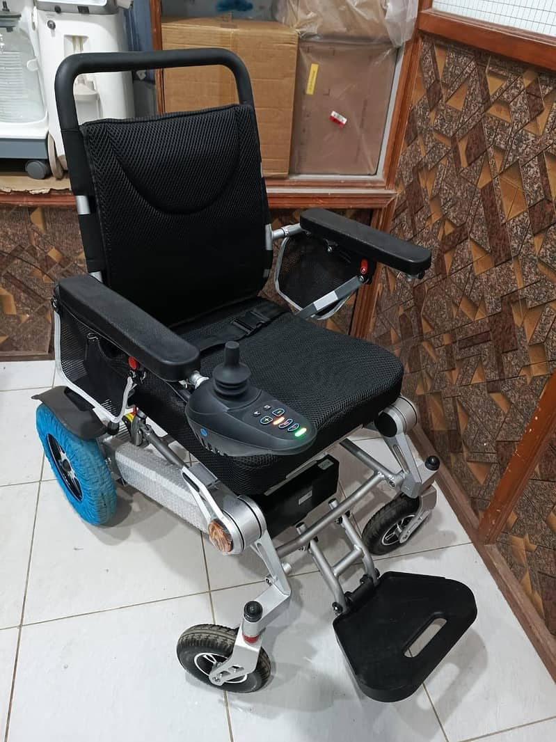 Electric wheel chair/ moterized wheel chair /patient wheel chair 3