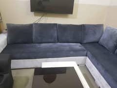 Two piece 9 seater corner sofa in gray/white color