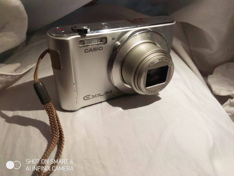 Casio camera 12 x (16.1 mega pixels) 13