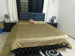 Black leather bed with wood frame , side tables mattress