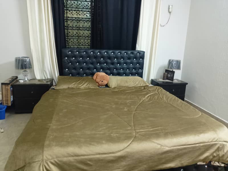 Black leather bed with wood frame , side tables mattress 1