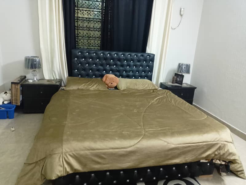 Black leather bed with wood frame , side tables mattress 2