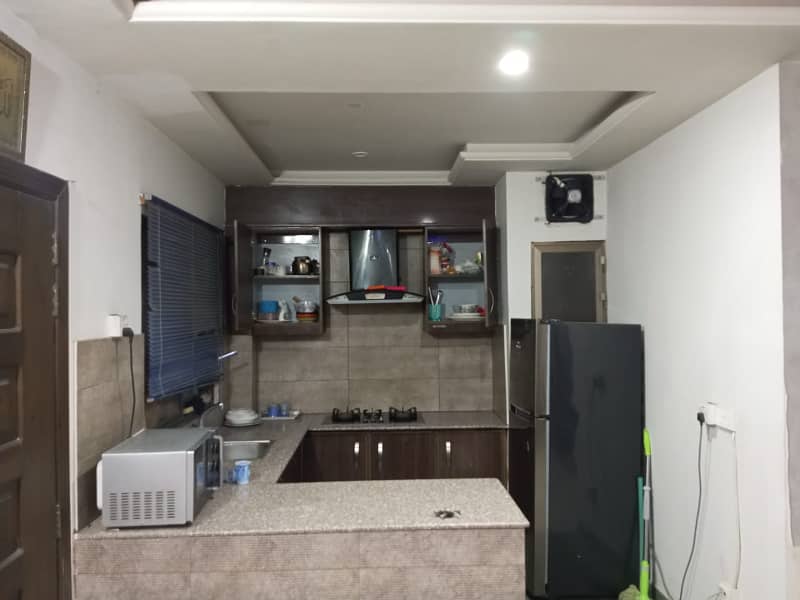 Two bed fully furnished apartment available for rent in E-11 Islamabad 9