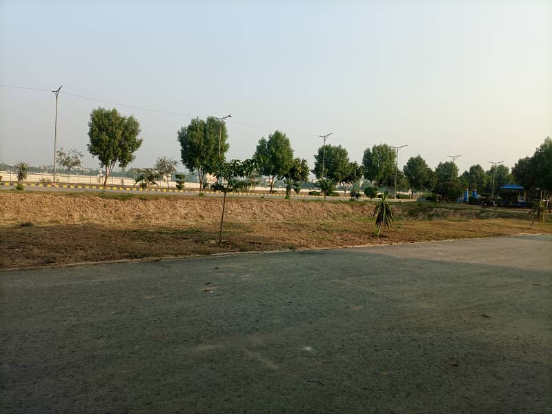 5 Marla Residencial plot For Sale Prime Location at Main Canal Road Lahore palm villas housing scheme canal road near jallo park Lahore 2