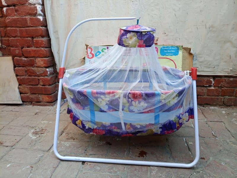 Fancy baby swing with cradle & mosquito net in metal frame. 1