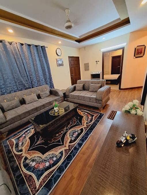 Three bed furnished apartment available for rent in E-11 Islamabad 15