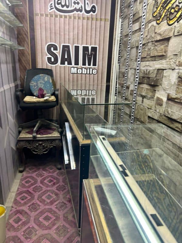 2 Shop Counters /Showcase for sale. made of solid wood and thick glass 1