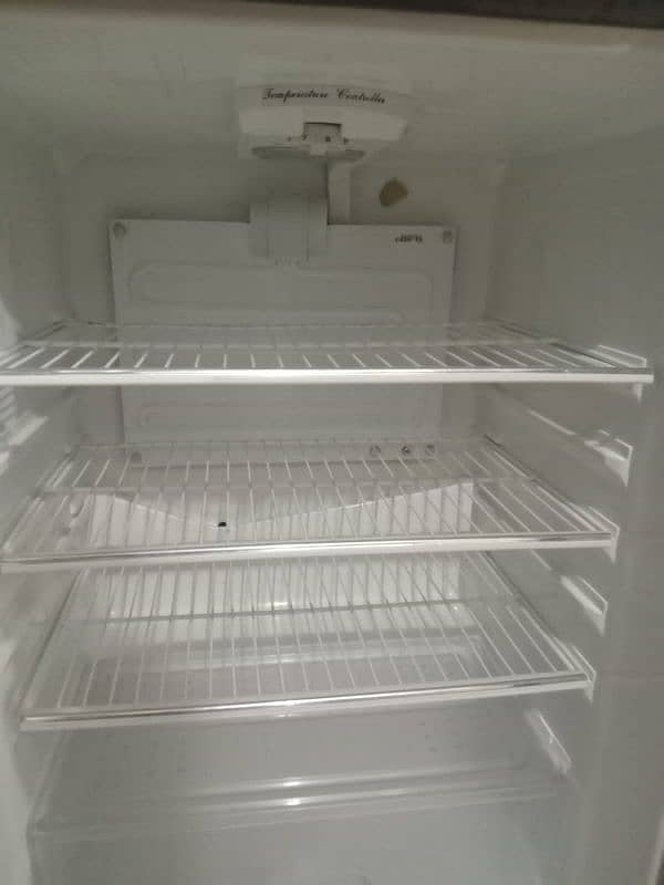 Dawlance refrigerator along with stabilizer 12