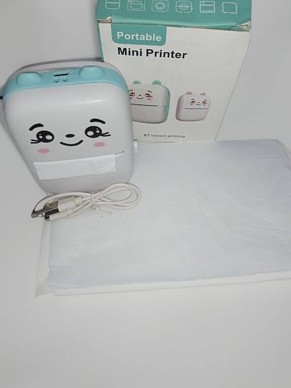 Mini portable inkless printer. 0