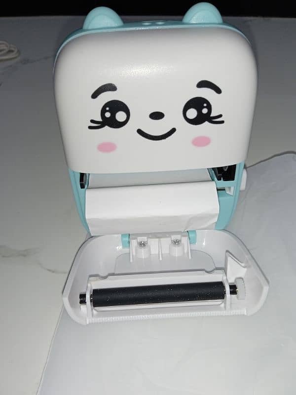 Mini portable inkless printer. 2