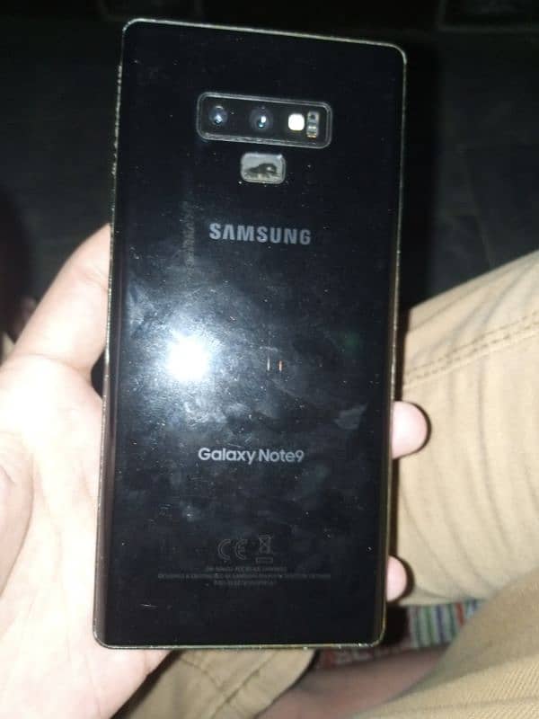 galaxy note 9 with charger aor cover 1