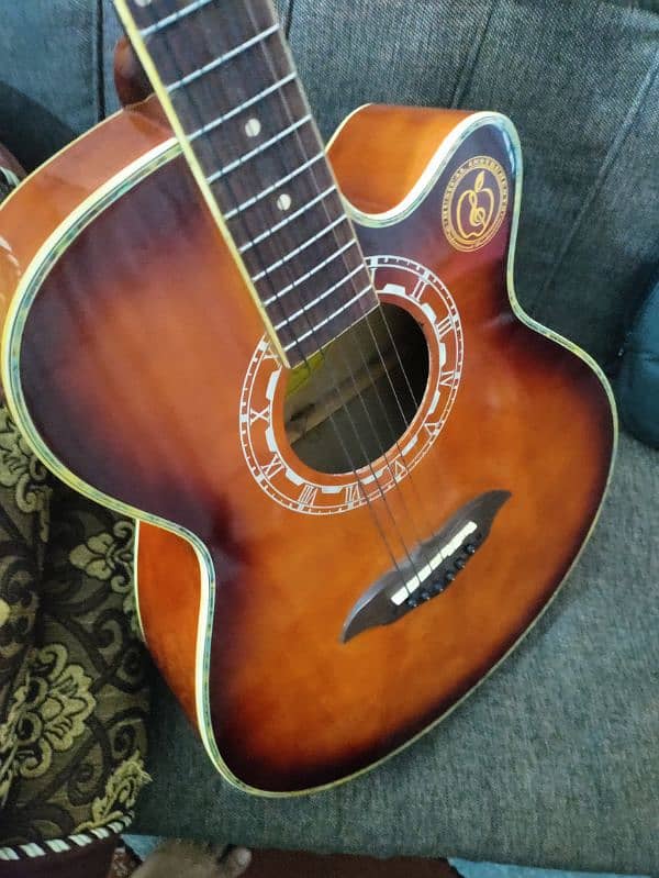 Acoustic guitar with bag,capo and picks 2