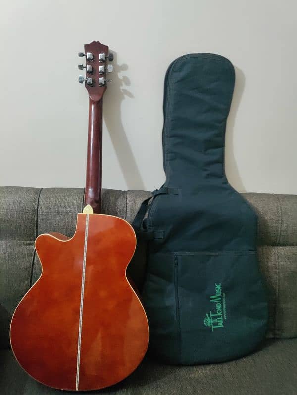 Acoustic guitar with bag,capo and picks 4