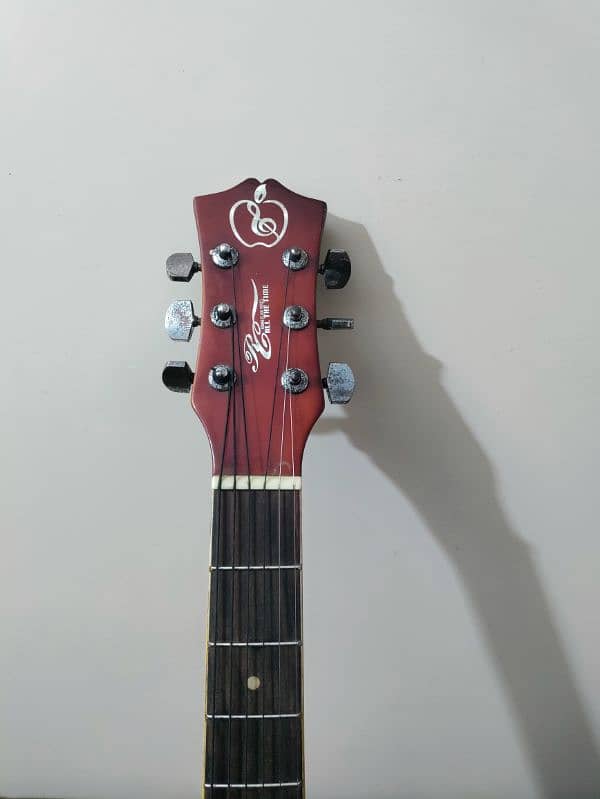 Acoustic guitar with bag,capo and picks 5