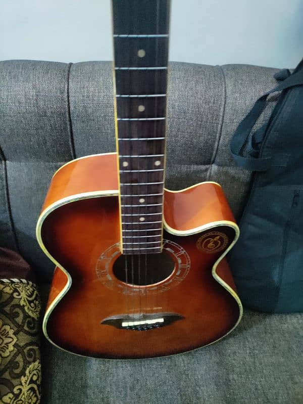 Acoustic guitar with bag,capo and picks 6