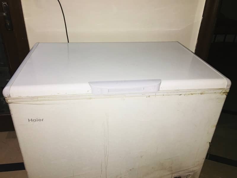 freezer here single door condition 10 by 10 brand new 0