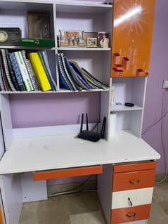 Single bed for kids with sidetable and cupboard