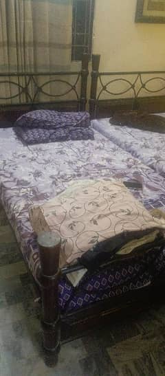 2 single beds available solid wood & Iron frame