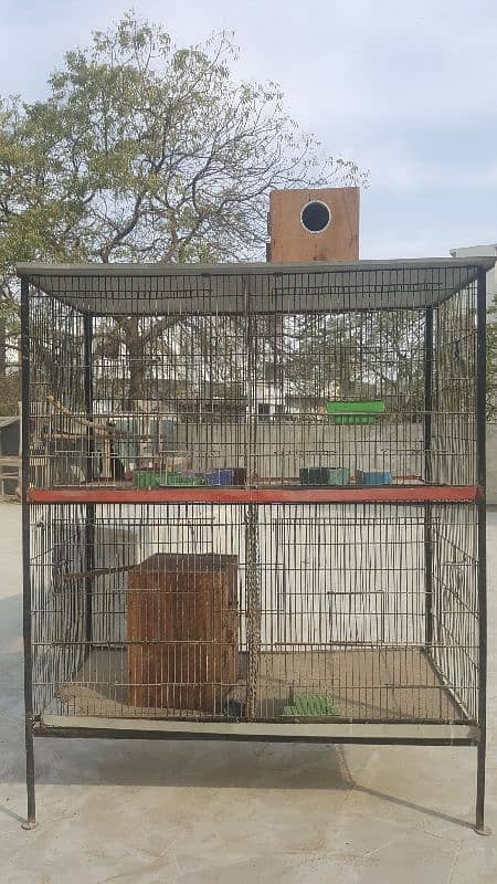 2 CAGES AND 5 NEST BOXES 1 BIG CAGE 2