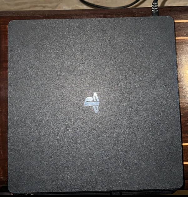 PS4 Slim 1TB with 2 controllers,PS Gold headset and 3games 0