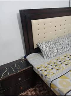 wooden double bed