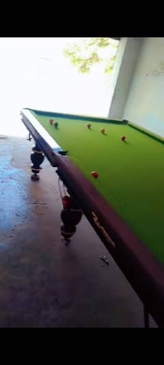 1 billiard table and 1 snooker table