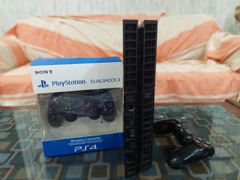 PS4 fat game for sale with 1000GB and 2 controllers+7 games installed 4