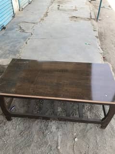 a sheet and wood table