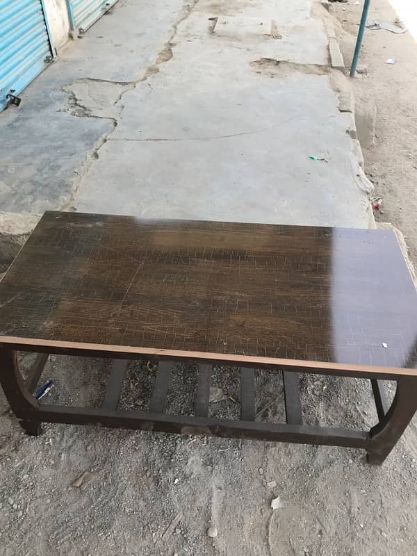 a sheet and wood table 0