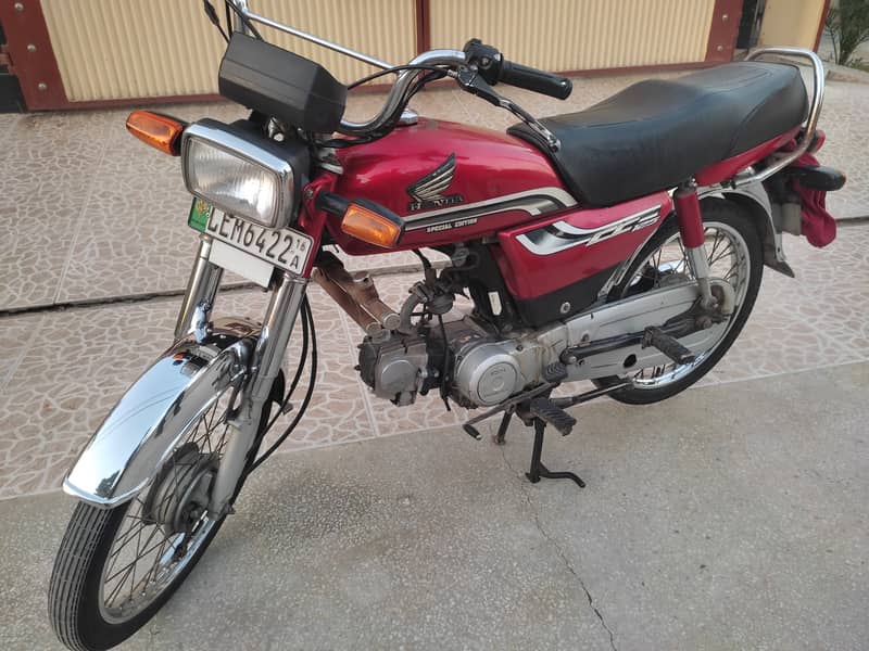 Honda CD 70cc Motor Cycle in Genuine Condition Having Red Color 0