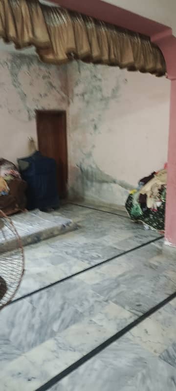 20 Marlas double storey old House main Shah Kamal Road jahanzeb Block Iqbal Town 7